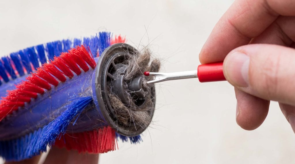 how to clean dog hair out of a Dyson roller brush