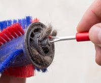 how to clean dog hair out of a Dyson roller brush